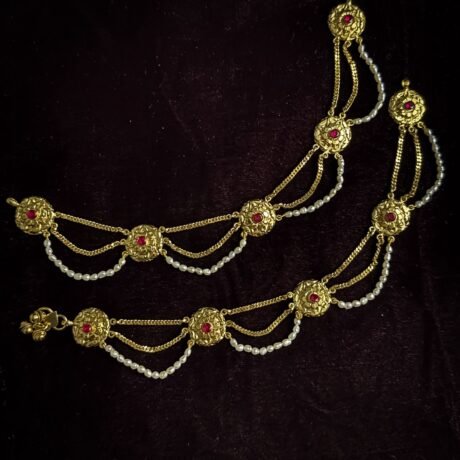 Purity: 92.5 Silver Length: 10" All our products are stamped with purity.  We provide a one year guarantee Delivery Time 12- 15 Days Please Note: Some of our jewellery pieces are ready to ship and may be delivered earlier than the estimated time. Made to order creations may take 12- 15 Days. For specific delivery details, please contact us at +91-8017244299. Jewellery Care Your Gahane jewellery is crafted with love and deserves the finest care to retain its timeless beauty. * Keep Away from Moisture Store your pieces in a dry pouch or wrap them in soft cotton muslin cloth. Avoid moisture, as it may damage the surface and finish. * Avoid Perfumes & Sprays Do not sprays perfumes or deodorants directly while wearing the jewellery, as they can corrode the surface and leave marks. * No Water Contact Even a few drops of water can dull the shine. If you’re preparing for a family gathering or celebration, gently clean your jewellery with a soft linen or cotton cloth before wearing. * Safe Storage Moisture can still see in even when stored in boxes. The safest way to protect your jewellery is to wrap them in butter paper or cotton cloth and place them in an airtight container. The butter paper locks out moisture and keeps your jewellery dry. * Regular Cleaning Use a soft suede cloth to wipe your jewellery. For light stains, gently use an eraser, then wipe again. If soiled, apply a little talcum powder with a delicate brush and wipe to maintain the shine. After cleaning, leave the pieces out to air you’ll notice their natural glow return. * Be Gentle with Chemicals if you must clean with chemicals, always using mild options. Diamonds and other gemstones may be cleaned with mild soap and warm water. At Gahane, we believe jewellery is not just an accessory it is heritage. With the right care, your pieces will shine on for generations